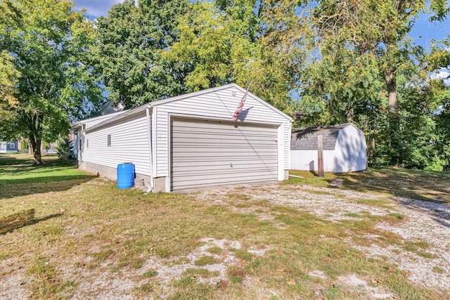 garage with a yard