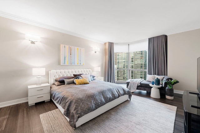 bedroom featuring dark hardwood / wood-style flooring and ornamental molding