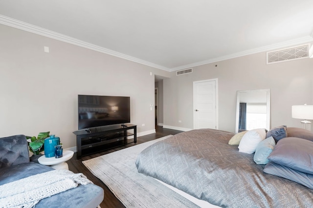 bedroom featuring dark wood-type flooring and ornamental molding