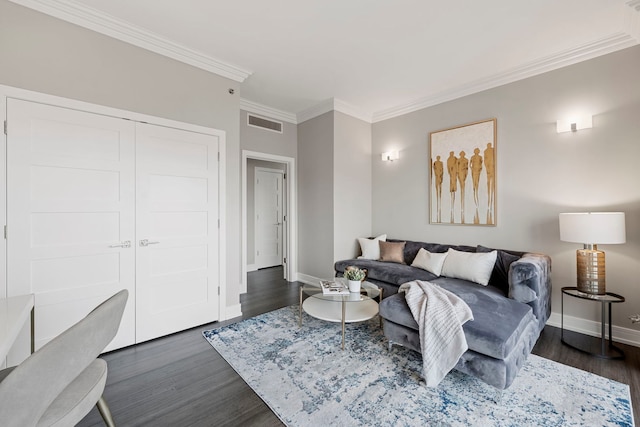 living room with dark hardwood / wood-style floors and ornamental molding