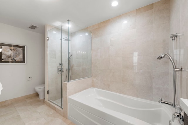 bathroom featuring tile patterned flooring, toilet, and plus walk in shower