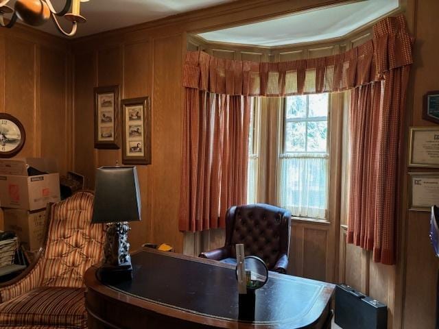 office area featuring wooden walls