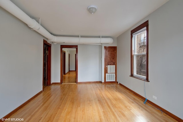 empty room featuring light wood-type flooring