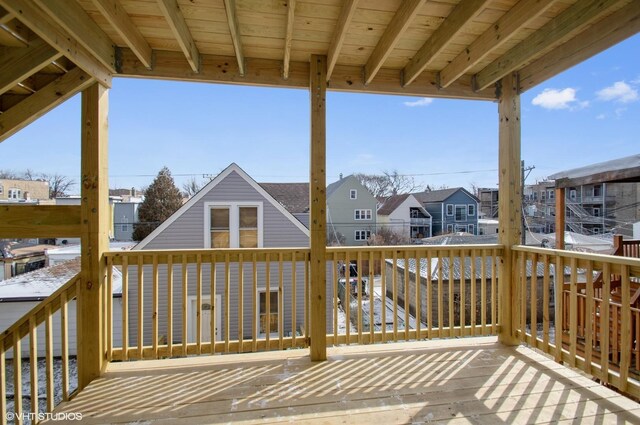 back of house with a balcony