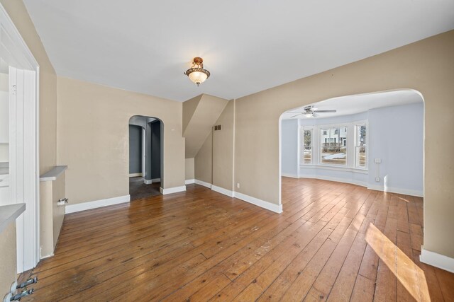 dining space with vaulted ceiling and hardwood / wood-style floors