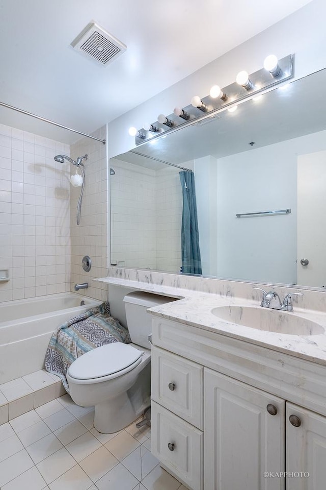 full bathroom featuring tile patterned flooring, vanity, shower / bath combination with curtain, and toilet