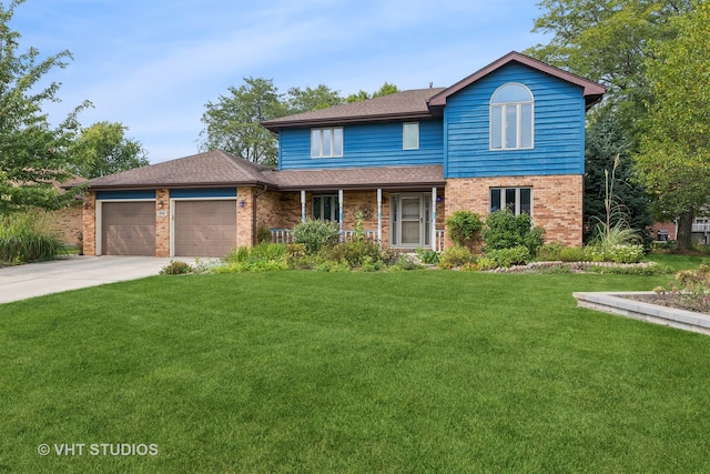 front facade with a garage and a front lawn