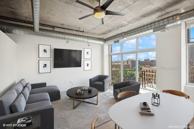 living room featuring ceiling fan