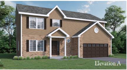 view of front of home featuring a front lawn and a garage