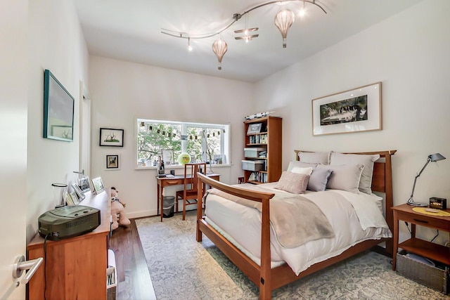 bedroom featuring hardwood / wood-style floors