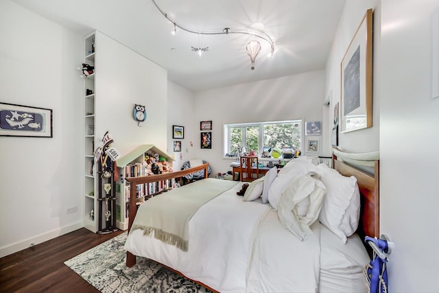 bedroom featuring dark hardwood / wood-style floors