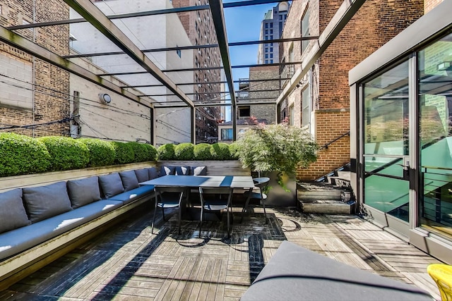 exterior space featuring an outdoor hangout area and a balcony