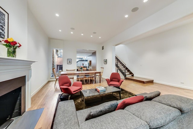 living room with light hardwood / wood-style floors