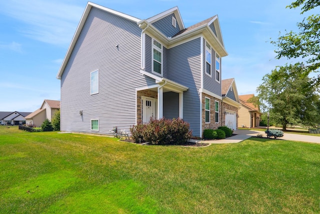 view of property exterior with a garage and a lawn