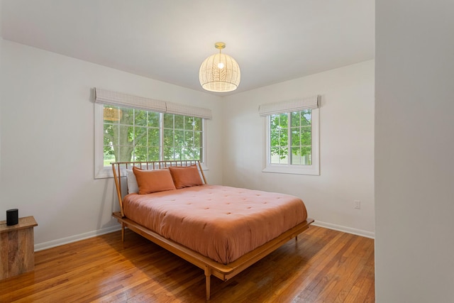 bedroom featuring hardwood / wood-style flooring