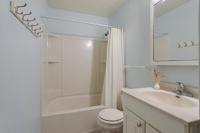 full bathroom featuring shower / bath combo, toilet, and vanity