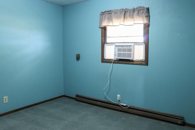 empty room featuring baseboard heating, carpet, and cooling unit