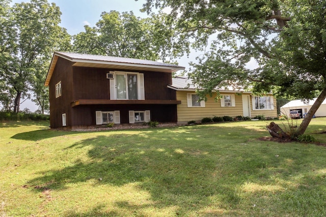 view of front of house with a front lawn