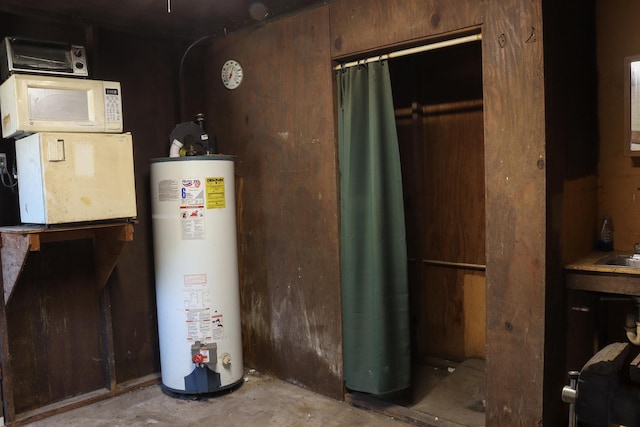 utilities featuring water heater and sink