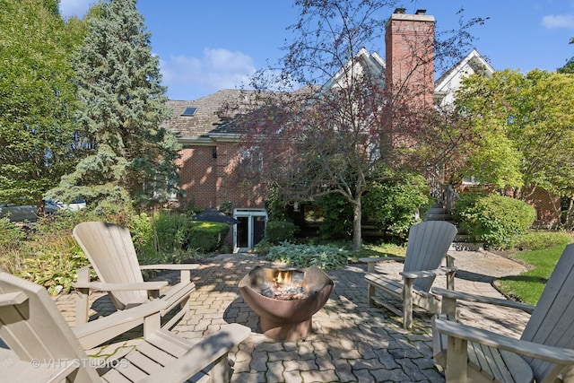 view of patio / terrace featuring a fire pit