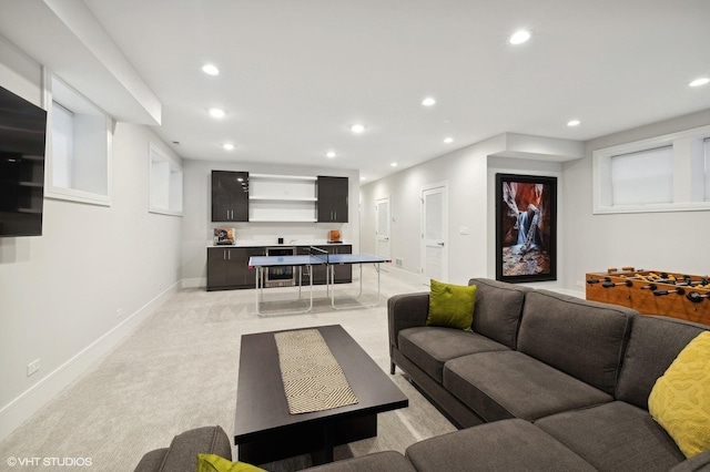 living room featuring light colored carpet