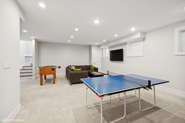 playroom featuring light colored carpet