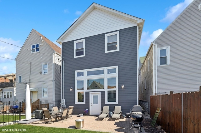 rear view of house featuring a patio area