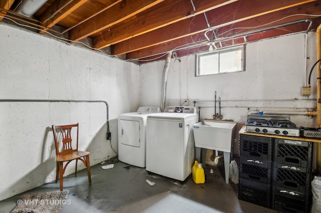 laundry room with independent washer and dryer