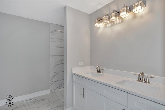 bathroom featuring tile flooring and double sink vanity