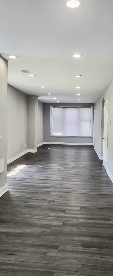 dining area with dark wood-type flooring