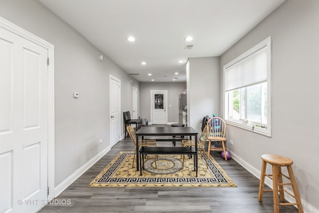 spare room with dark hardwood / wood-style flooring