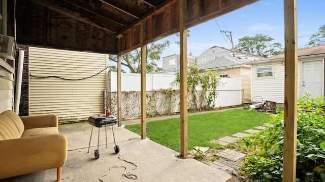 exterior space with a wall mounted air conditioner