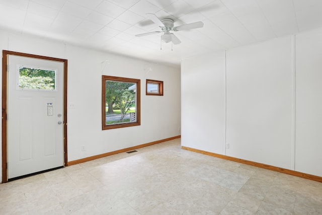 foyer entrance featuring ceiling fan and light tile patterned floors