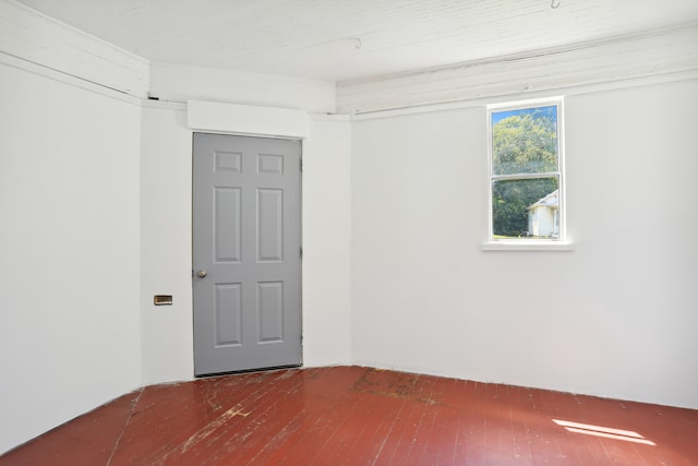 unfurnished room featuring wood-type flooring