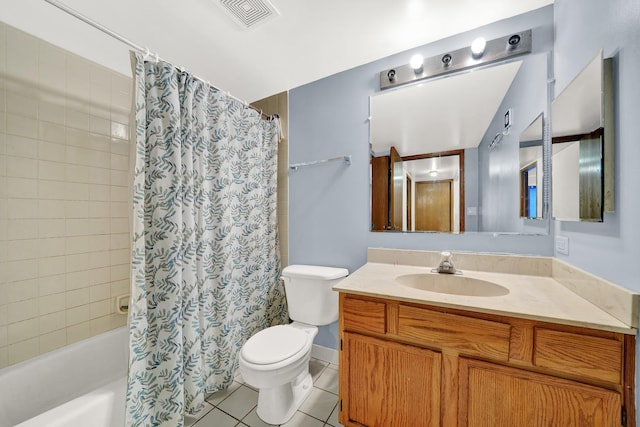 full bathroom featuring shower / bathtub combination with curtain, tile patterned floors, toilet, and vanity