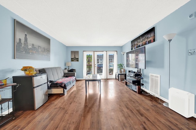 living room with hardwood / wood-style flooring