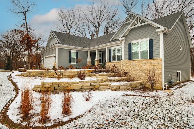 craftsman-style house featuring a garage