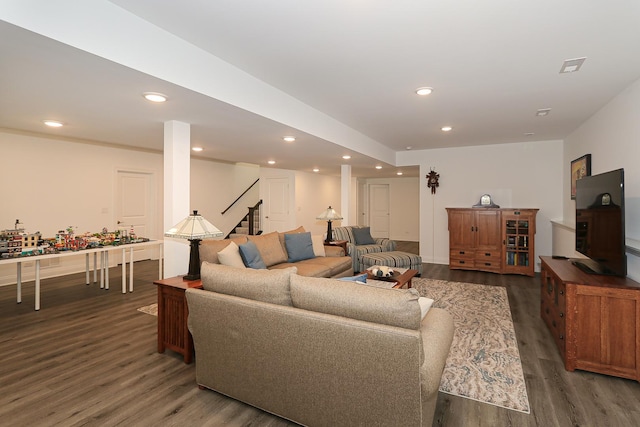 living room featuring dark hardwood / wood-style floors