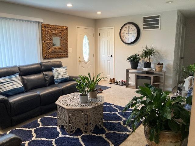 living room with carpet flooring