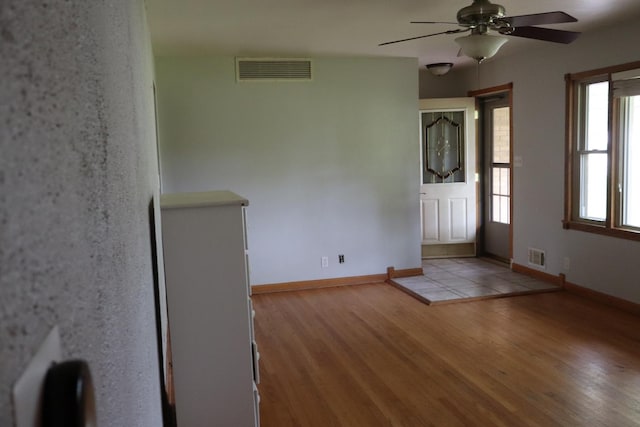 entryway featuring ceiling fan and light wood-type flooring