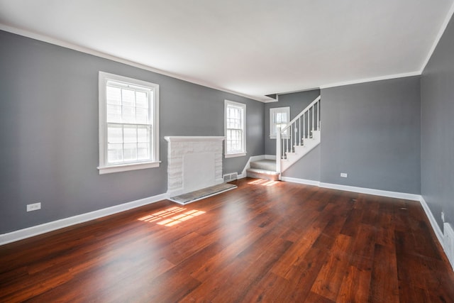 interior space featuring crown molding and dark wood-type flooring