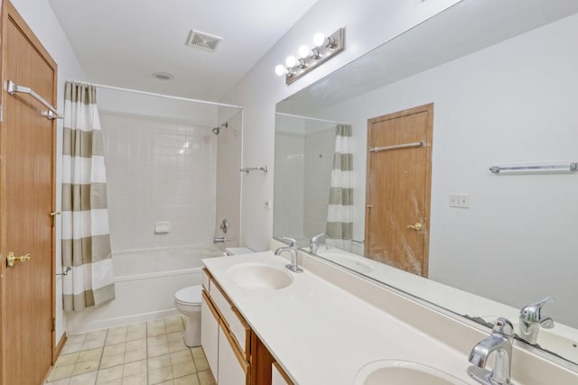 full bathroom with vanity, tile patterned flooring, toilet, and shower / bath combo