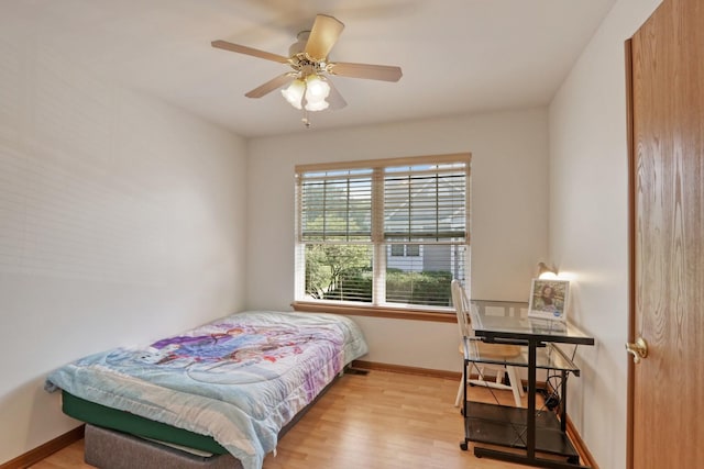 bedroom featuring light hardwood / wood-style flooring and ceiling fan