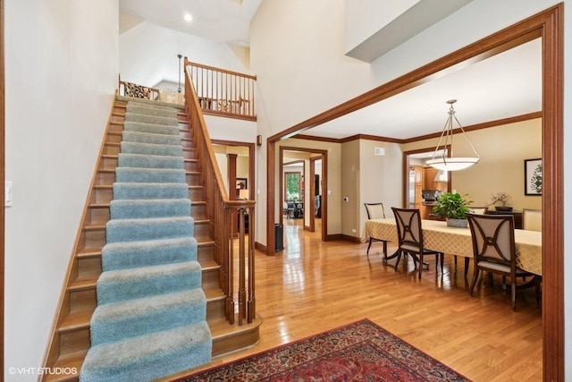 stairway featuring wood-type flooring