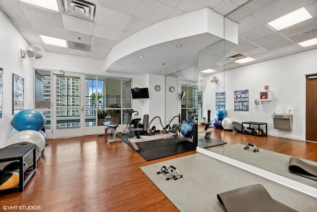 gym featuring hardwood / wood-style floors