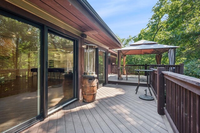 wooden deck with a gazebo