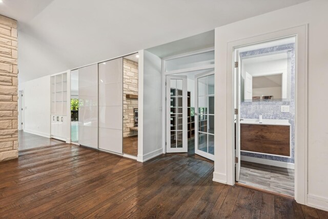 interior space featuring dark hardwood / wood-style flooring and french doors