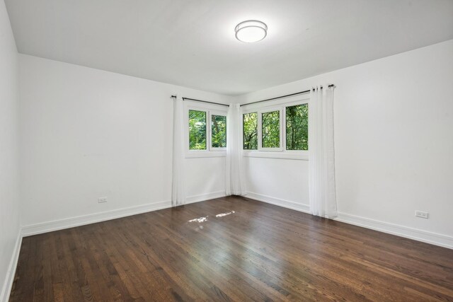 empty room featuring hardwood / wood-style floors