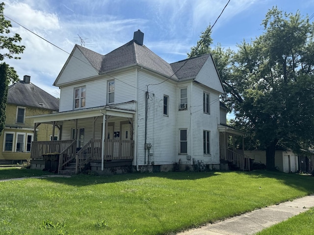 exterior space with a porch and a front lawn