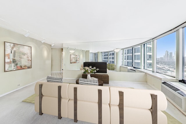 155 N Harbor Dr Unit 1003, Chicago, IL 60601 - carpeted living area featuring rail lighting and baseboards